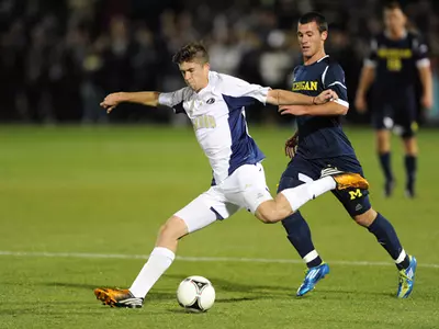 Men's Soccer Holds Off Michigan, Meves Ties School Record Image