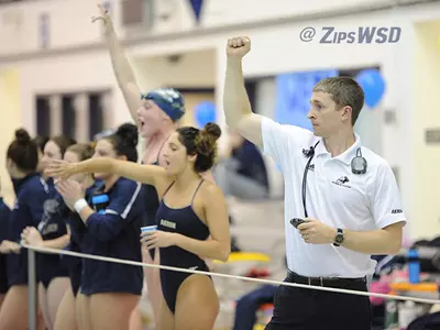 Swimming and Diving splits weekend dual meet action Image