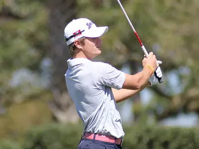 Charlie Bull Tied for First; Men's Golf in Second at MAC Championship Image