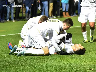 Holthusen Lifts Akron to 3-2 MAC Tournament Victory Over West Virginia Image