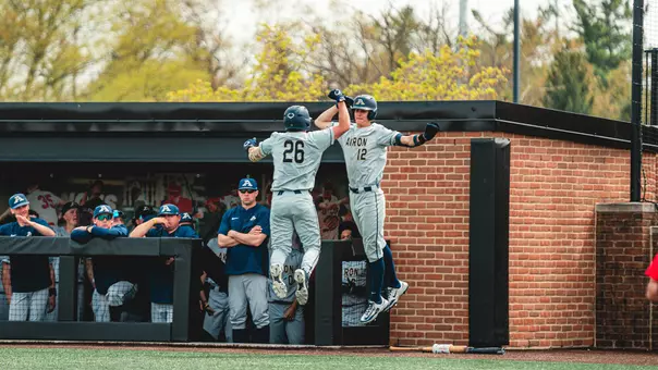 Akron Baseball celebrating a home run hit by Mitchel Szymczak