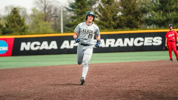 Mitchel Szymczak rounding the bases after a home run at Ball State