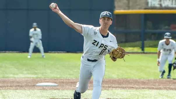 Action photo of Elijah Griffith pitching against NIU