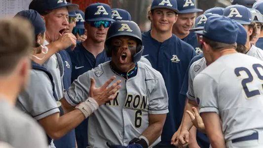 Photo of kelton Phillips and the Akron baseball team celebrating