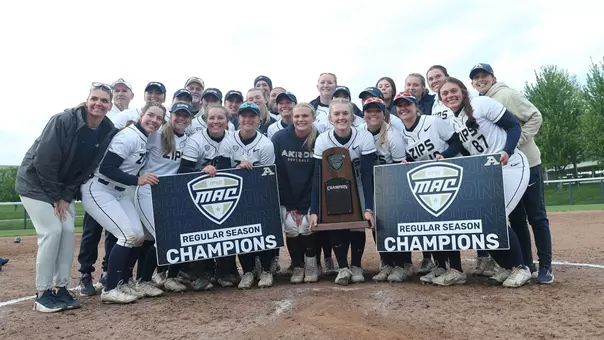 Celebration photo of the Akron Zips Softball team after winning the regular season