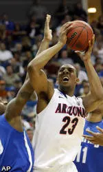 Wildcats Tame Tigers Late, 77-75 To Advance