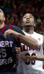 Perry Has Career High, Cats Cruise Past RMU