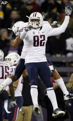 Wildcats Fall to Huskies 42-31