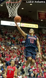 Red Holds off Blue for 62-58 Victory