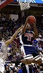 Hassan Adams Earns All-District Honors from Basketball Times