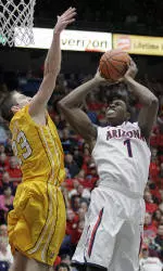 Wildcats Take Season Opener, 73-64