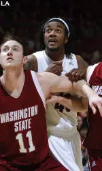 Cats' Second-Half Run Drops Cougars