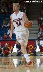 Cats' Balance Wins Opener