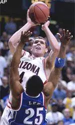 Jayhawks End Wildcats' Tourney Run