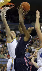 Cats Down Bruins, 77-63