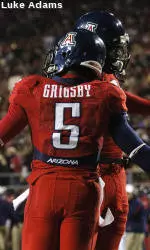 Tuitama Leads Arizona Over BYU in Las Vegas Bowl