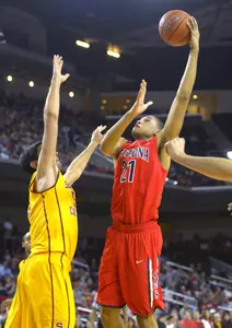 Arizona forward Brandon Ashley, right,