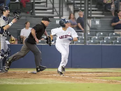 Trent Gilbert watches his triple soar to CF.