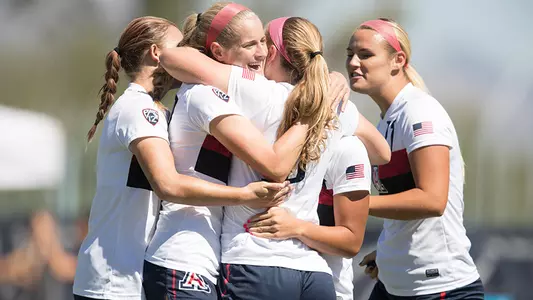 Soccer celebrates goal versus UCLA