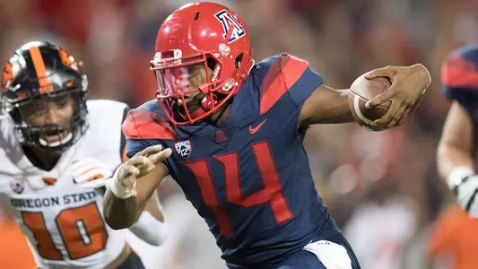 Sophomore quarterback Khalil Tate (14)