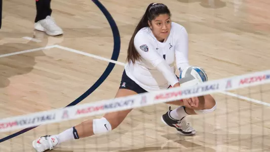 Senior defensive specialist Kimberly Gutierrez (1)