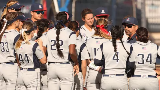 Candrea talks to the team