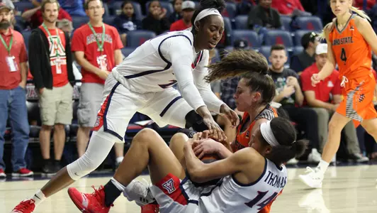 Senior forward Destiny Graham (21) and sophomore forward Sam Thomas (14)
