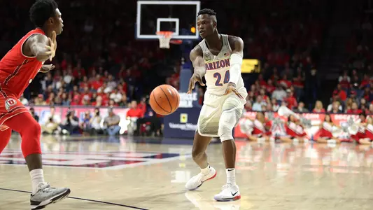 Emmanuel Akot picks up an assist versus Utah