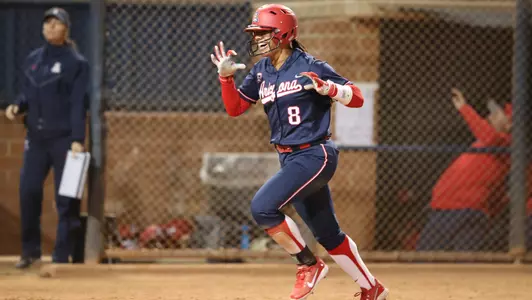 Sophomore catcher Dejah Mulipola (8)