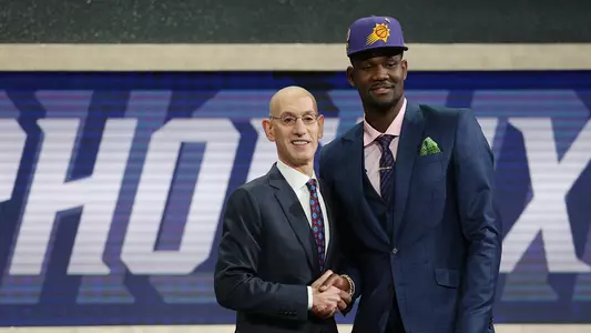 Deandre Ayton shakes hands with Adam Silver at the 2018 NBA Draft.