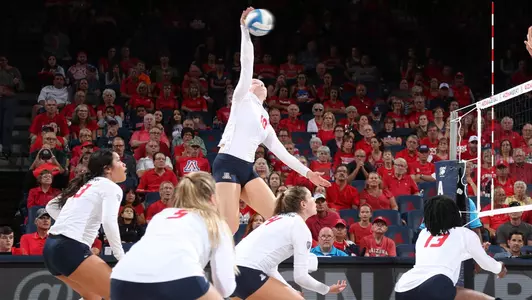 Sophomore outside hitter Paige Whipple (10)