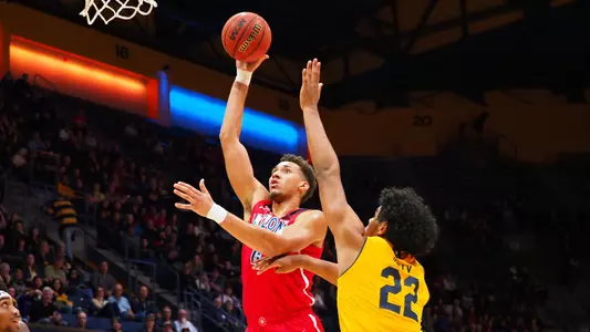 Chase Jeter scores on a hook shot in the first half at Cal.