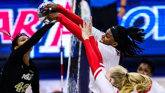 Arizona Wildcats middle blocker Devyn Cross (13) blocks a shot during the Arizona Wildcats volleyball game vs. Alabama State 9/20/19 in Tucson, Ariz.Photo by Mike Christy / Arizona Athletics