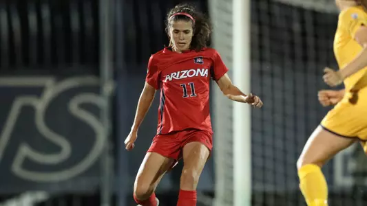 Junior midfielder Morgan McGarry (11)