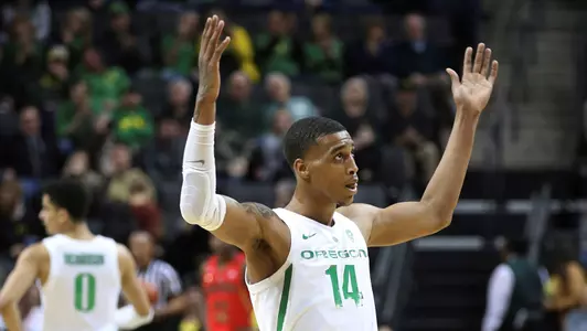Oregon's Kenny Wooten gestures to the crowd at the end of the team's NCAA college basketball game against Arizona on Saturday, March 2, 2019, in Eugene, Ore. (AP Photo/Chris Pietsch)
