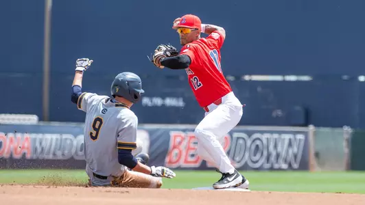 Justin Wylie turns a double play