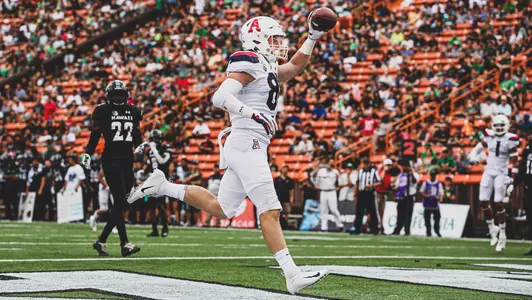Arizona Wildcats tight end Bryce Wolma (81) celebrates his touchdown during the Arizona Wildcats vs. Hawaii Rainbow Warriors college football game 8/24/19 at Aloha Stadium in Honolulu, HI.Photo by Mike Christy / Arizona Athletics