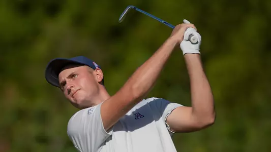 Jack Norwich hits an iron shot during Blessings Collegiate Invitational in Arkansas