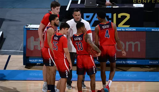Arizona huddles during its game at UCLA