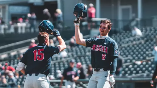 Daniel Susac helps Jacob Berry celebrate his home run