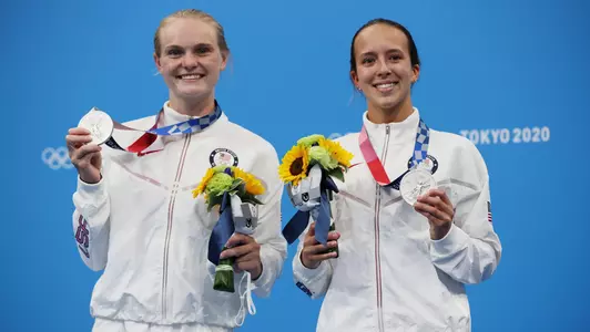 TOKYO, JAPAN - JULY 27: Silver medalists Delaney Schnell and Jessica Parratto of Team United States pose during the medal ceremony for the Women's Synchronised 10m Platform Final on day four of the Tokyo 2020 Olympic Games at Tokyo Aquatics Centre on July 27, 2021 in Tokyo, Japan. (Photo by Tom Pennington/Getty Images)