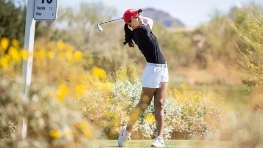 Yu-Sang Hou admires her tee shot at the 2021 NCAA Championships