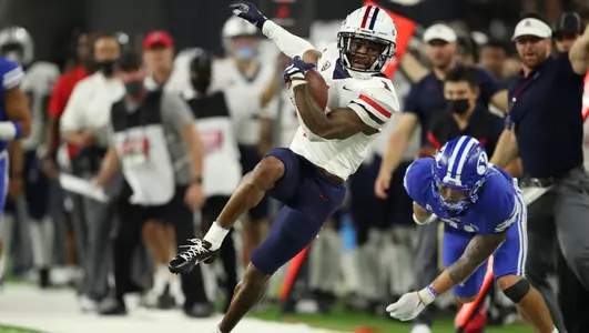 Stanley Berryhill III tight ropes along the sideline versus BYU