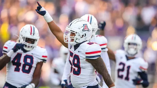 linebacker Jacob Manu (59), linebacker Jerry Roberts (48) - SEATTLE, WASH. -- Football vs. Washington at Husky Stadium.Oct. 15, 2022. Photo by Mike Christy / Arizona Athletics