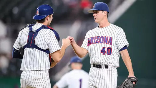 Quinn Flanagan, Daniel Susac — ARLINGTON, TEXAS -- Baseball vs. Oklahoma in the State Farm College Showdown at Gloge Life FieldFeb. 19, 2022. Photo by Mike Christy / Arizona Athletics