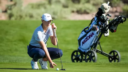 Gile Bite Starkute stares down her potential putt at the Match in the Desert.