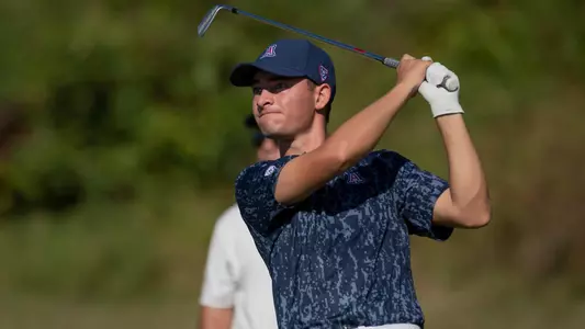 Sam Sommerhauser stares down his iron shot at the Blessings Collegiate Invitational