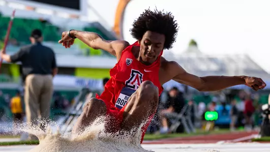 Reinaldo Rodrigues in the long jump at the 2022 NCAA Outdoor Track and Field Championships at Hayward Field