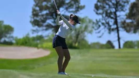 Carolina Melgrati hits a shot from the fairway during the 2022 NCAA Albuquerque Regional.