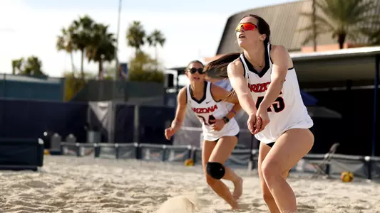 Grace Cook (45), Annie Kost (14) - TUCSON, ARIZ. -- Beach Volleyball vs Oregon, Cactus Classic at Bear Down Beach Feb. 24, 2023.
Photo by Catherine Regan / Arizona Athletics